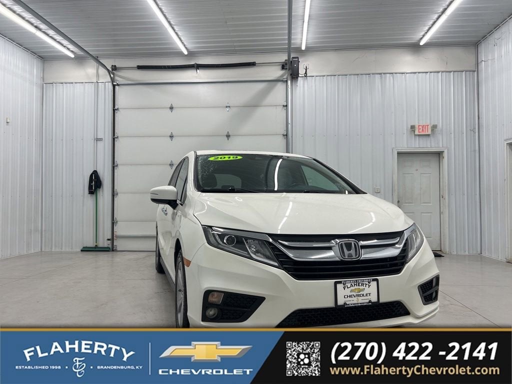 2019 Honda Odyssey EX-L in White — front three-quarter view